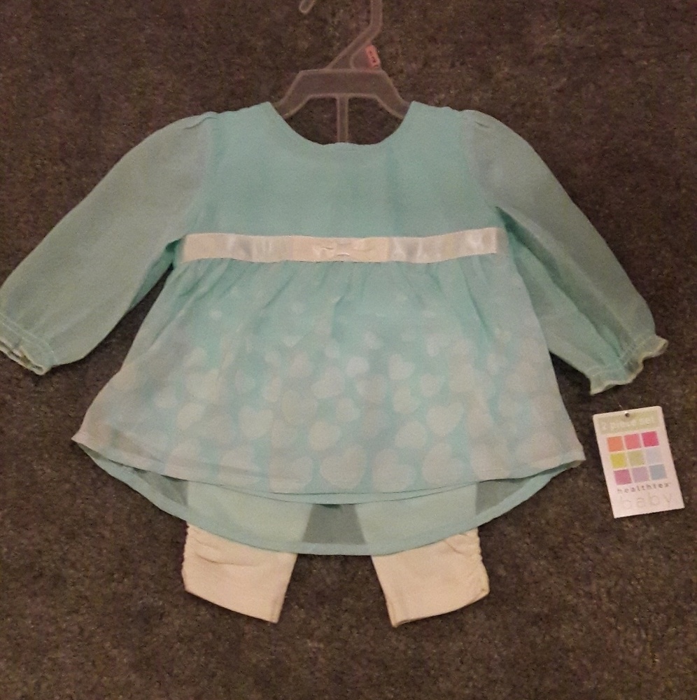 Light blue blouse with white tights